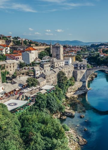 Mostar, Bosnia and Herzegovina - August 25, 2015. View with Stari Most (english: Old Bridge), reconstructed 16th century Ottoman bridge, main attraction of Mostar Old Town